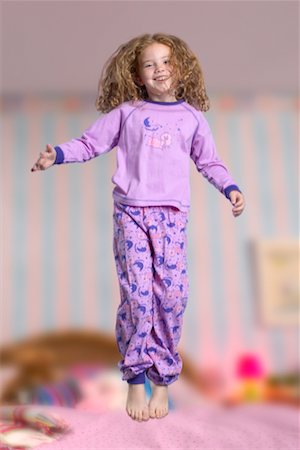 simsearch:700-00519358,k - Child Jumping on Bed Stock Photo - Rights-Managed, Code: 700-00519371