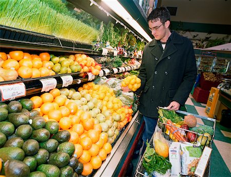 shopping cart fruits and vegetables - Man Grocery Shopping Stock Photo - Rights-Managed, Code: 700-00519437