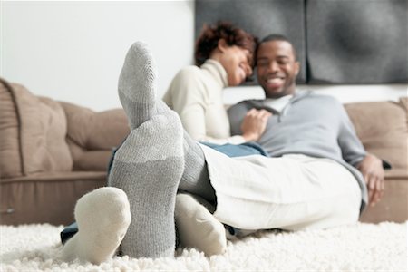 Couple Snuggling on Floor Stock Photo - Rights-Managed, Code: 700-00524018