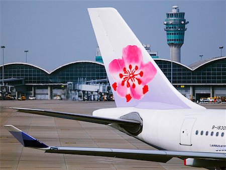 Tail Art On An Airplane, Chep Lap Kok Airport, Hong Kong, China Stock Photo - Rights-Managed, Code: 700-00524347