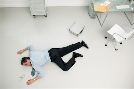 Dead Businessman in Office Stock Photo - Rights-Managed, Code: 700-00524656