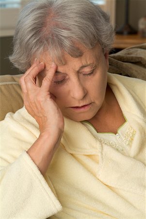 feeble - Woman With Headache Foto de stock - Con derechos protegidos, Código: 700-00524909