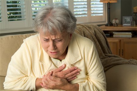 feeble - Woman With Chest Pain Foto de stock - Con derechos protegidos, Código: 700-00524910