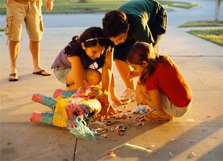 Kids Grabbing Candy From Broken Pinata Stock Photo - Rights-Managed, Code: 700-00526626