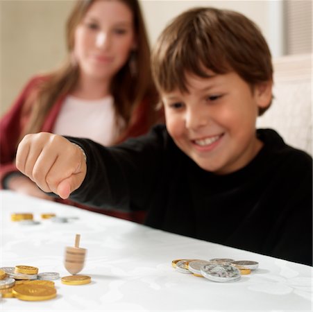 simsearch:632-03424261,k - Boy Spinning Dreidel Stock Photo - Rights-Managed, Code: 700-00527007