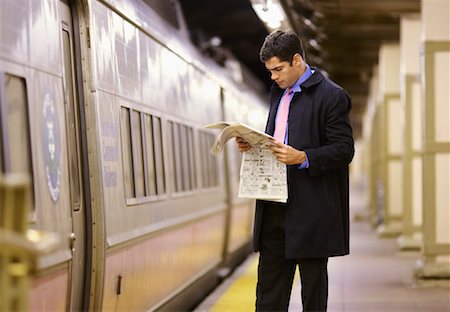 simsearch:700-00695787,k - Man Reading Newspaper in Subway Station, New York, USA Stock Photo - Rights-Managed, Code: 700-00527034