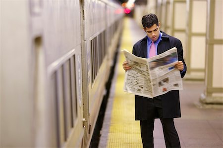 simsearch:700-00695787,k - Man Reading Newspaper in Subway Station, New York, USA Stock Photo - Rights-Managed, Code: 700-00527033