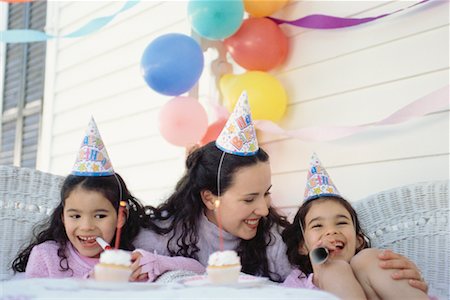 simsearch:700-00551400,k - Mother Celebrating Birthday of Twin Daughters Stock Photo - Rights-Managed, Code: 700-00528020
