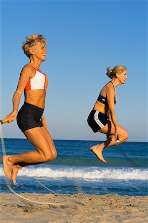 simsearch:700-00439935,k - Two Women Jumping Rope On Beach Stock Photo - Rights-Managed, Code: 700-00528182