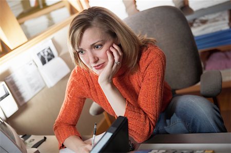 simsearch:700-01248157,k - Portrait of Woman in Home Office Stock Photo - Rights-Managed, Code: 700-00528228