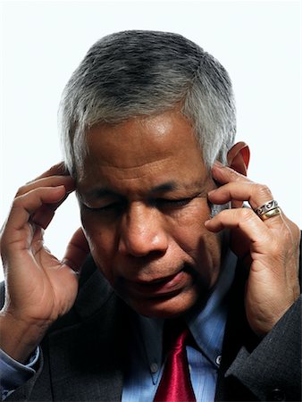 simsearch:6109-08203934,k - Portrait of Businessman with Headache Stock Photo - Rights-Managed, Code: 700-00528957