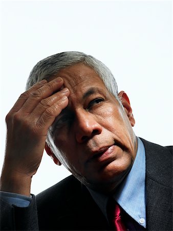 face front man - Portrait d'homme d'affaires avec des maux de tête Photographie de stock - Rights-Managed, Code: 700-00528958
