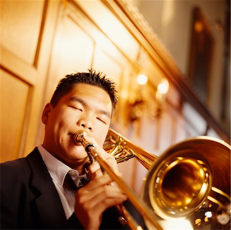 simsearch:640-01365707,k - Portrait of Man Playing Trombone Stock Photo - Rights-Managed, Code: 700-00529200