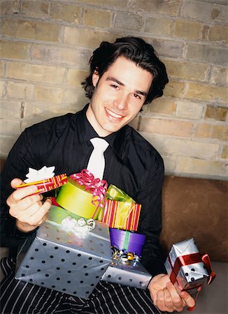 simsearch:649-08085108,k - Man Holding Many Gifts Stock Photo - Rights-Managed, Code: 700-00529244