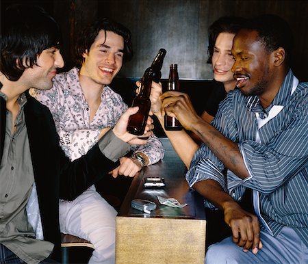 simsearch:673-02139140,k - Men in Bar Toasting One Another Stock Photo - Rights-Managed, Code: 700-00529260