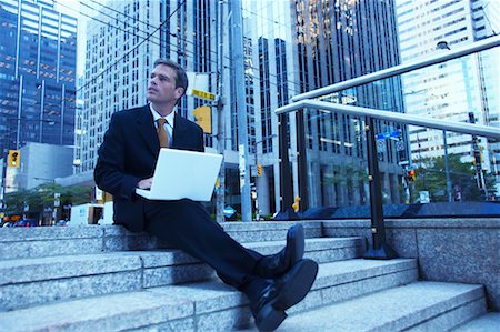 simsearch:700-00281308,k - Businessman Using Laptop Stock Photo - Rights-Managed, Code: 700-00529289