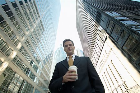 Businessman with Coffee Outdoors Stock Photo - Rights-Managed, Code: 700-00529309