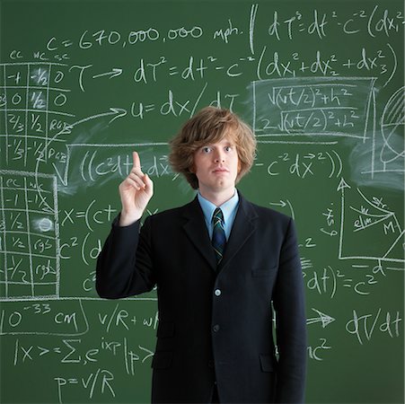 symbol for students education - Portrait of Man in Front of Chalkboard Stock Photo - Rights-Managed, Code: 700-00529412