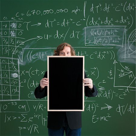 pupil in a empty classroom - Man Holding Blank Chalkboard Stock Photo - Rights-Managed, Code: 700-00529421