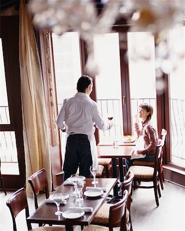 Woman being Served in Restaurant Stock Photo - Rights-Managed, Code: 700-00529520