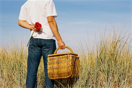 simsearch:700-00529622,k - Man Holding Picnic Basket and Flower Stock Photo - Rights-Managed, Code: 700-00529614