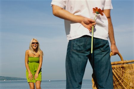 simsearch:700-00529622,k - Man Surprising Woman with Flower and Picnic Stock Photo - Rights-Managed, Code: 700-00529618
