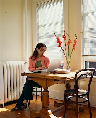 simsearch:700-00609240,k - Woman Working On Laptop At Home Stock Photo - Rights-Managed, Code: 700-00529709