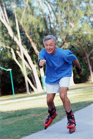 simsearch:700-00190697,k - Man Rollerblading Stock Photo - Rights-Managed, Code: 700-00529739