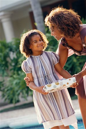 Woman Hugging Girl Outdoors Stock Photo - Rights-Managed, Code: 700-00529931