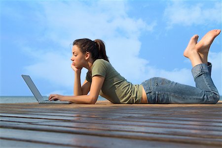 simsearch:700-00522867,k - Woman Lying on Dock, Using Laptop Stock Photo - Rights-Managed, Code: 700-00520124