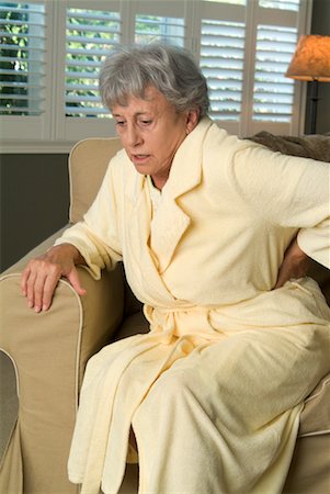 feeble - Woman Sitting in Chair Stock Photo - Rights-Managed, Code: 700-00520265