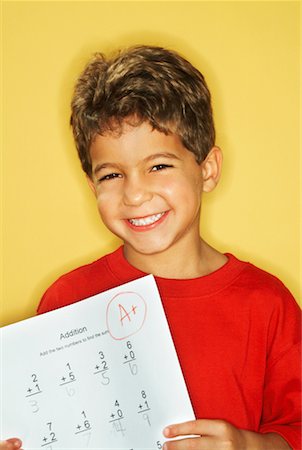 simsearch:700-01954519,k - Portrait of Boy with Schoolwork Stock Photo - Rights-Managed, Code: 700-00520528