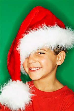 simsearch:700-01236595,k - Portrait of Boy Wearing Santa Hat Stock Photo - Rights-Managed, Code: 700-00520533