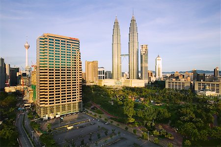 Exxon Mobil Building and Petronas Twin Towers, Kuala Lumpur, Malaysia Stock Photo - Rights-Managed, Code: 700-00520852