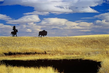 silo alberta - Silhouette of Man Hunting Buffalo Alberta, Canada Stock Photo - Rights-Managed, Code: 700-00520960