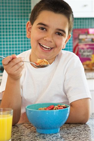 simsearch:700-00515127,k - Boy Eating Breakfast Stock Photo - Rights-Managed, Code: 700-00521020