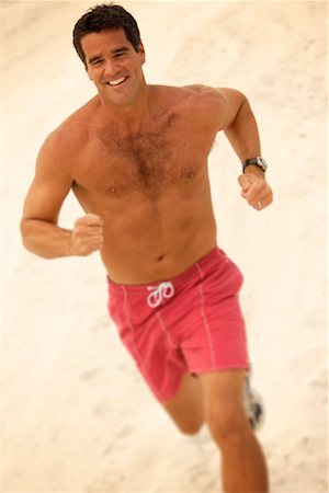 simsearch:700-00350110,k - Man Running on Beach Stock Photo - Rights-Managed, Code: 700-00522584