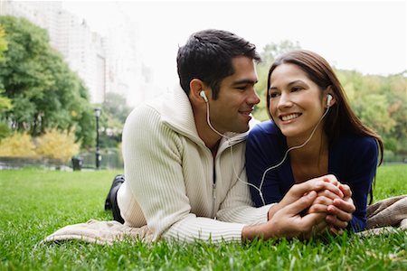 simsearch:700-00523685,k - Couple Lying on Grass and Listening to Music Stock Photo - Rights-Managed, Code: 700-00522648