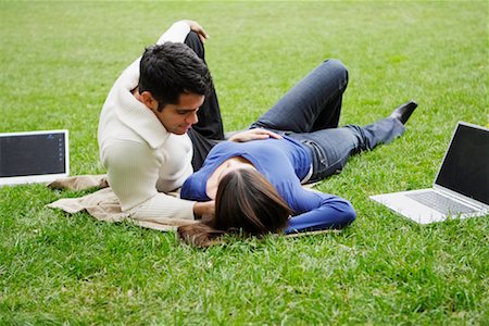 simsearch:700-00523685,k - Couple Lying on Grass with Two Laptops Stock Photo - Rights-Managed, Code: 700-00522649