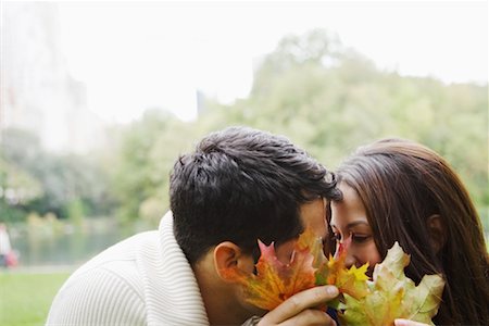 simsearch:700-00523685,k - Couple Hiding Behind Leaves Stock Photo - Rights-Managed, Code: 700-00522651