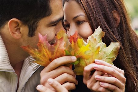 simsearch:700-00523685,k - Couple Hiding Behind Leaves Stock Photo - Rights-Managed, Code: 700-00522652