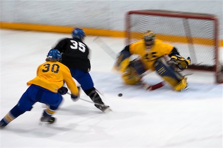 simsearch:700-00522757,k - Match de hockey Photographie de stock - Rights-Managed, Code: 700-00522761