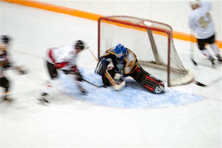 simsearch:700-00522757,k - Match de hockey Photographie de stock - Rights-Managed, Code: 700-00522771