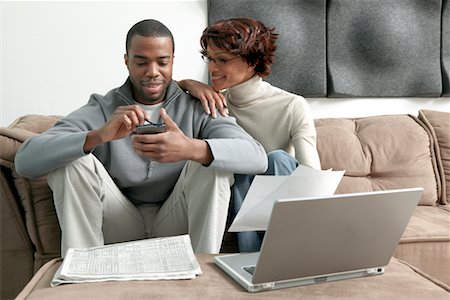 simsearch:700-00609233,k - Couple Using Laptop Computer And Electronic Organizer Stock Photo - Rights-Managed, Code: 700-00522807