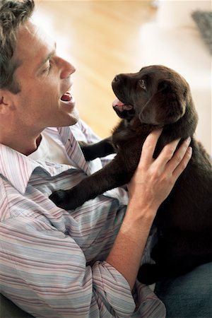 simsearch:700-00897631,k - Man With Puppy Stock Photo - Rights-Managed, Code: 700-00522814
