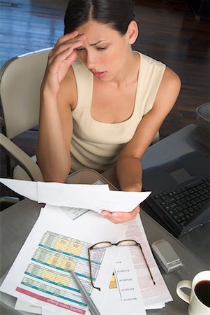 simsearch:6108-06167824,k - Woman Overwhelmed By Paperwork Stock Photo - Rights-Managed, Code: 700-00522873