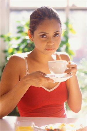 puerto rican ethnicity (female) - Woman Drinking Coffee Stock Photo - Rights-Managed, Code: 700-00523200