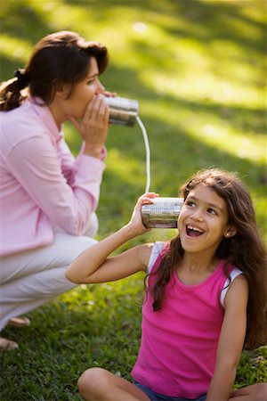 simsearch:700-00025806,k - Mother and Daughter Playing with Tin Can Telephone Stock Photo - Rights-Managed, Code: 700-00523283