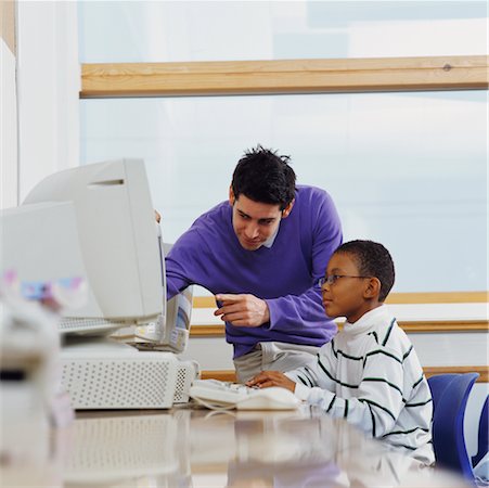 Teacher Helping Student on Computer Stock Photo - Rights-Managed, Code: 700-00523416