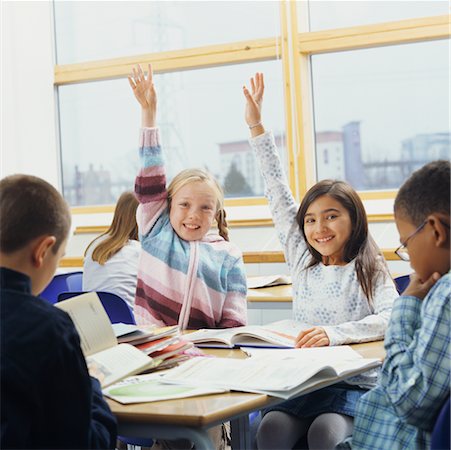 english book - Girls Raising Hands in Classroom Stock Photo - Rights-Managed, Code: 700-00523412